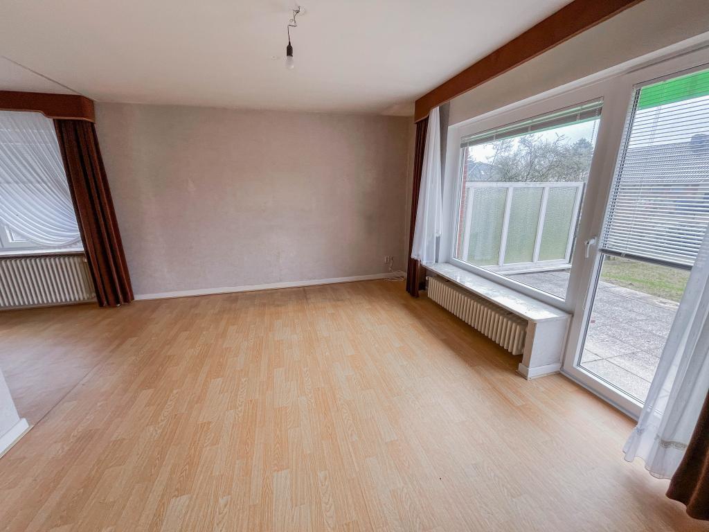 Einfamilienhaus: Wohnzimmer mit Terrassenzugang