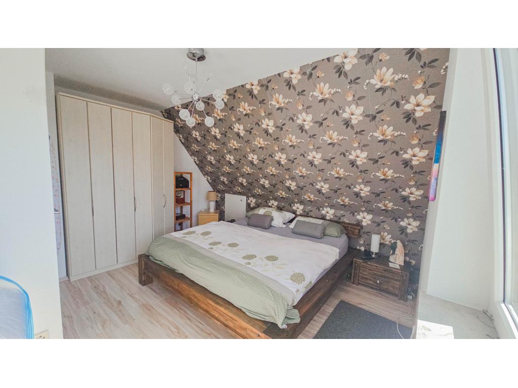 Einfamilienhaus: Schlafzimmer 1