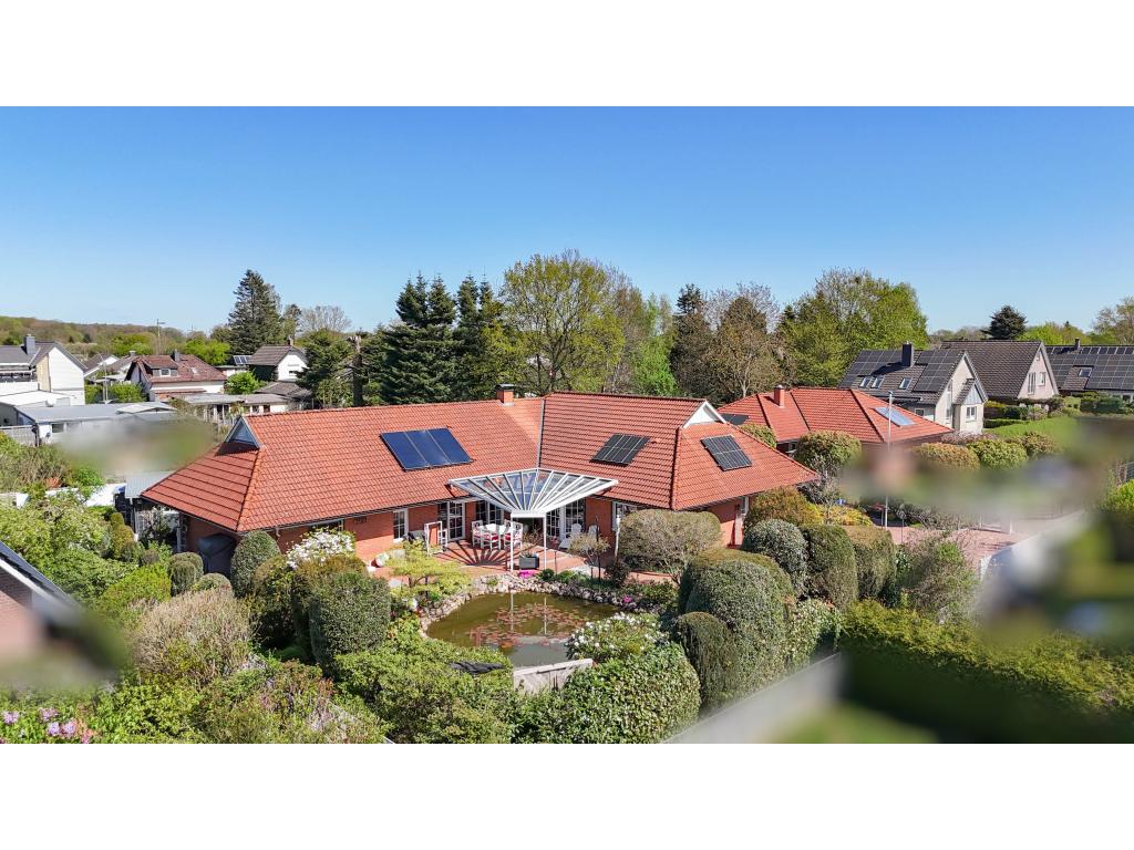 Einfamilienhaus: Rückansicht des Hauses mit Südterrasse