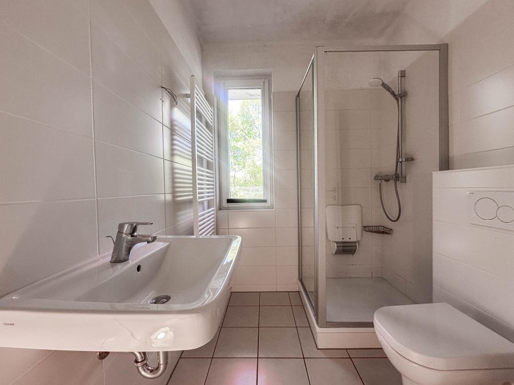 Einfamilienhaus: Badezimmer im EG