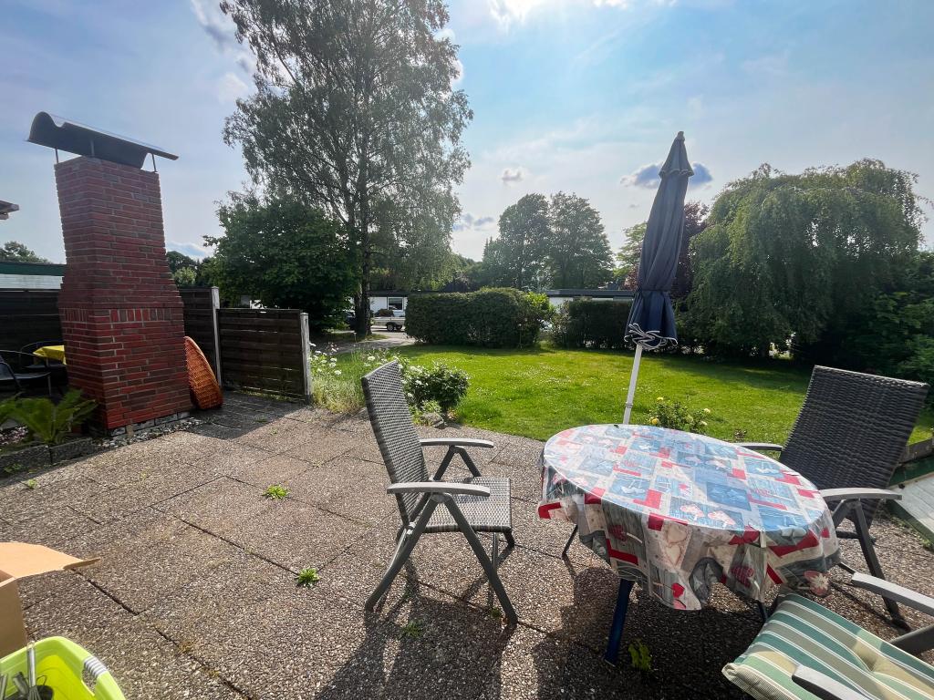Einfamilienhaus: Terrasse + Garten
