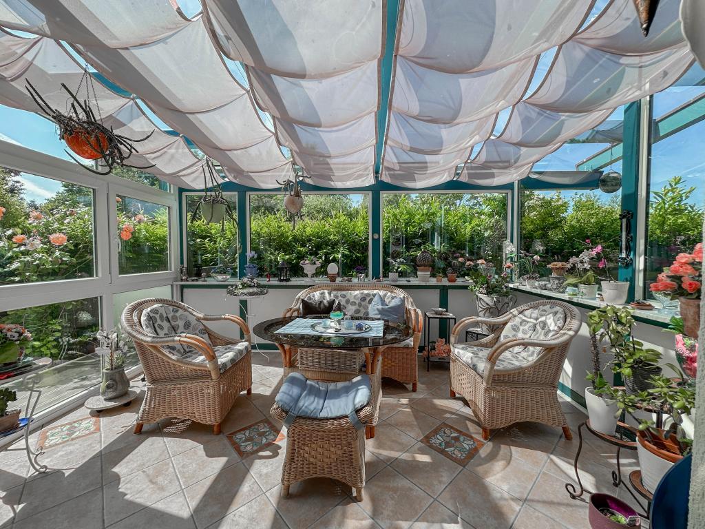 Einfamilienhaus: beheizter Wintergarten