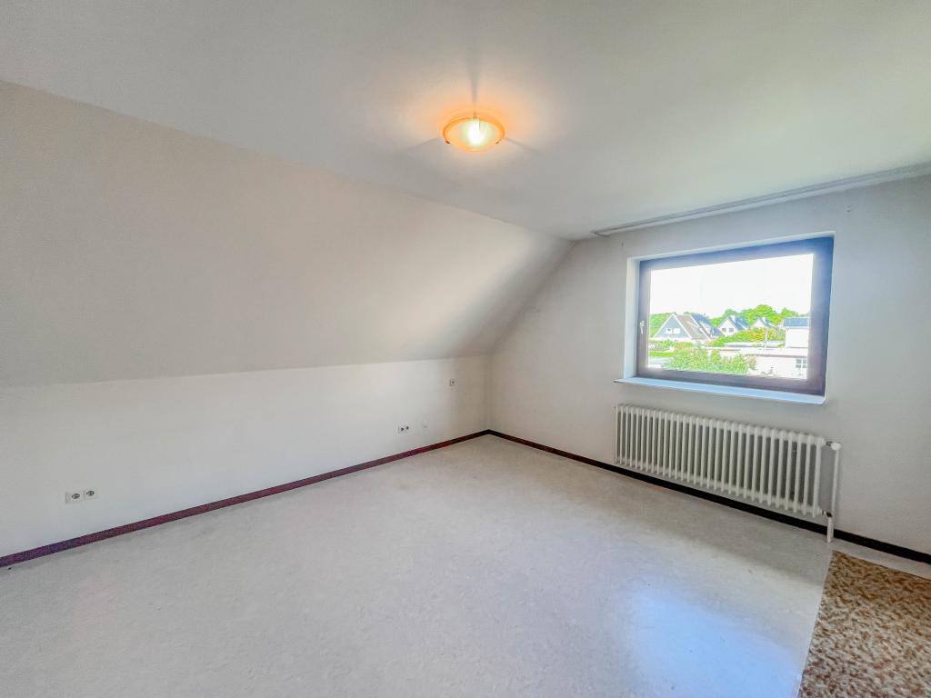 Einfamilienhaus: Schlafzimmer im DG