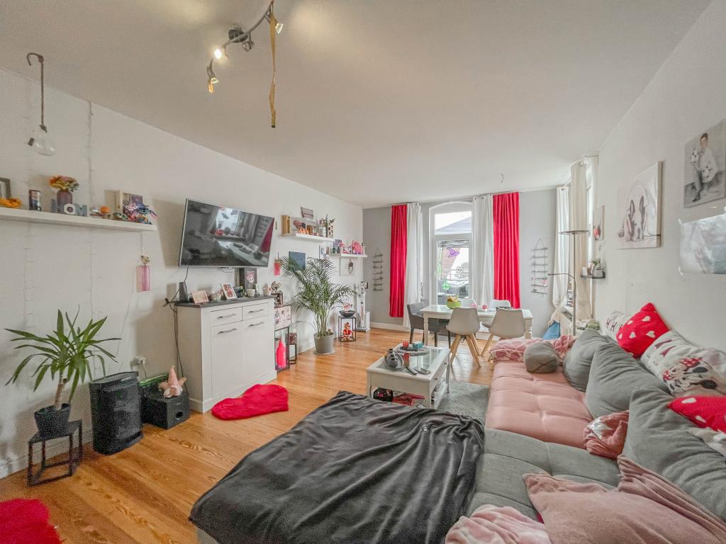 Mehrfamilienhaus: Wohnzimmer - Wohnung DG