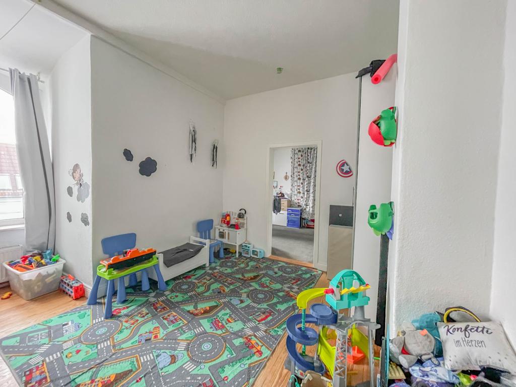 Mehrfamilienhaus: Kinderzimmer - Wohnung DG