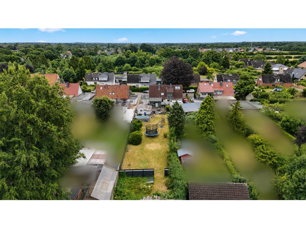 Doppelhaush&auml;lfte: Gartenansicht