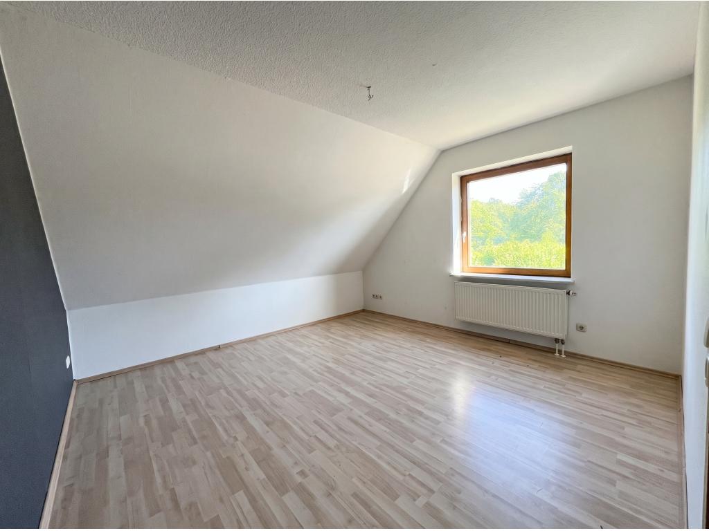 Einfamilienhaus: Schlafzimmer 1 - Wohnung 3 (OG)