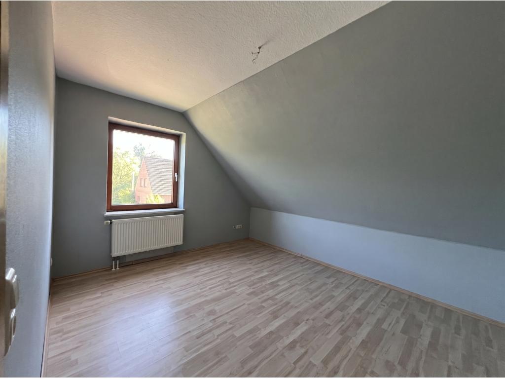 Einfamilienhaus: Zimmer 2 - Wohnung 3 (OG)