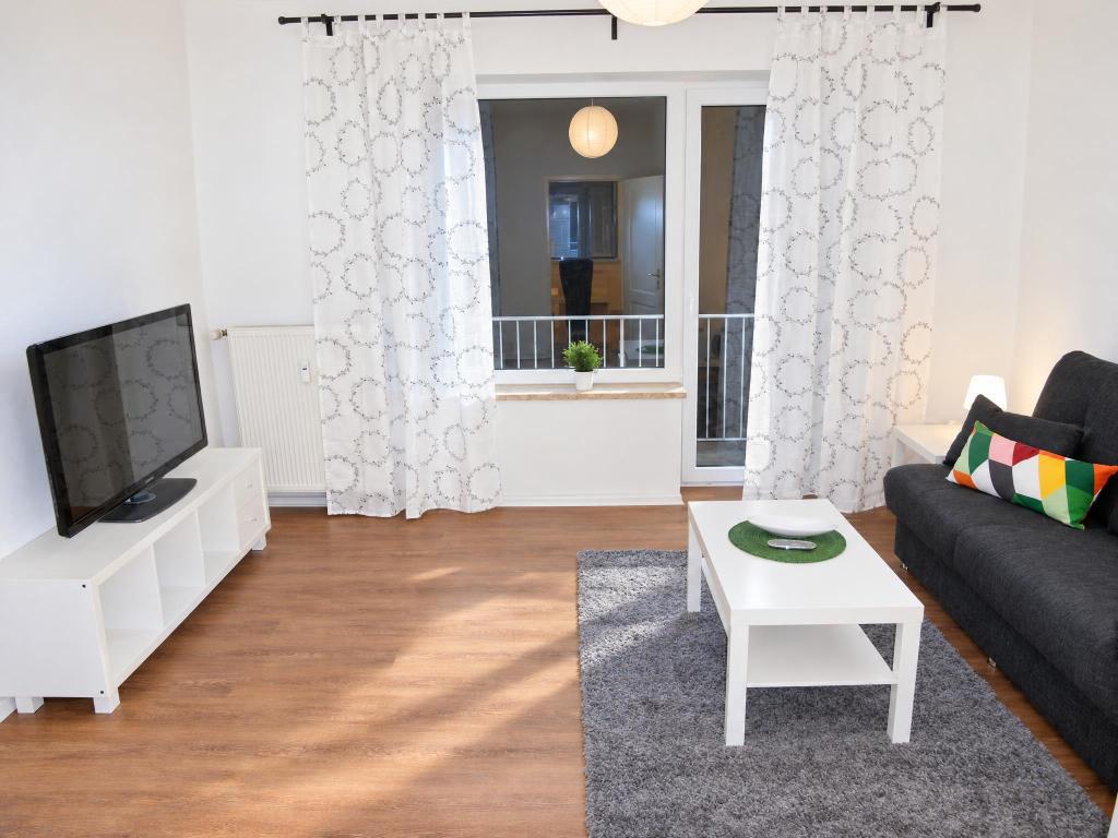 Wohnung 3 - Wohnzimmer Mehrfamilienhaus: Wohnung 3 - Wohnzimmer